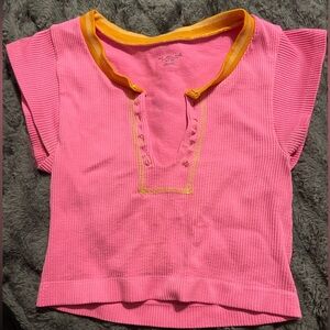 Urban Outfitters Go for Gold top in color pink with orange trim size xs/s